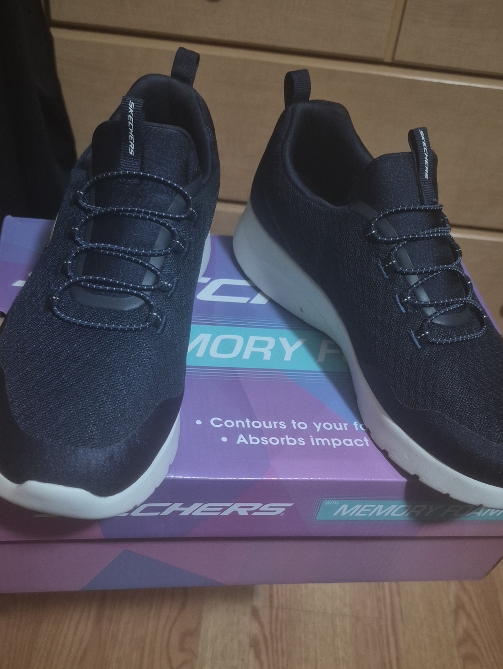 Skechers Men's Black Slip-On Knit Sneakers with White Sole